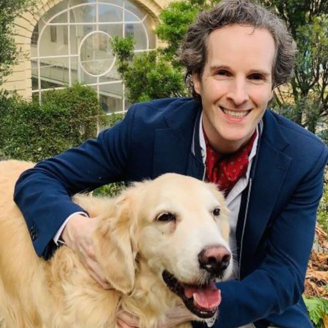 Felix Prehn with Winston, his adopted golden retriever