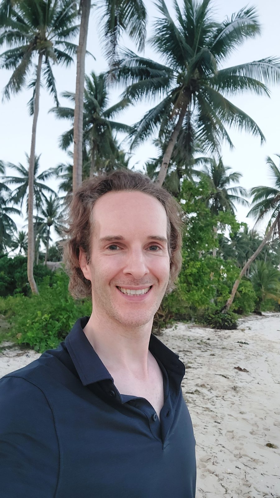 Nikolas Prehn (Felix Nikolas Prehn), among palm trees on a beach