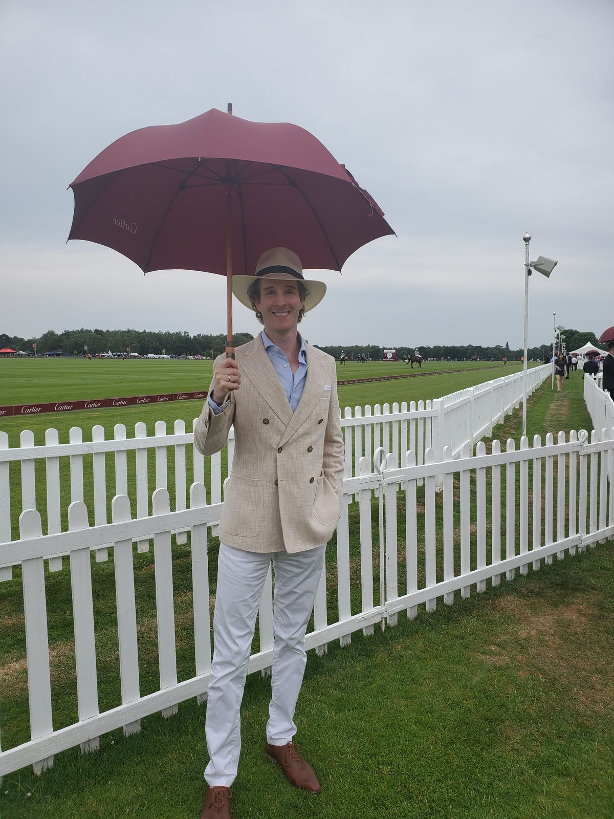 Nikolas Prehn (Felix Nikolas Prehn), in a cream jacket and panama hat at a polo ground
